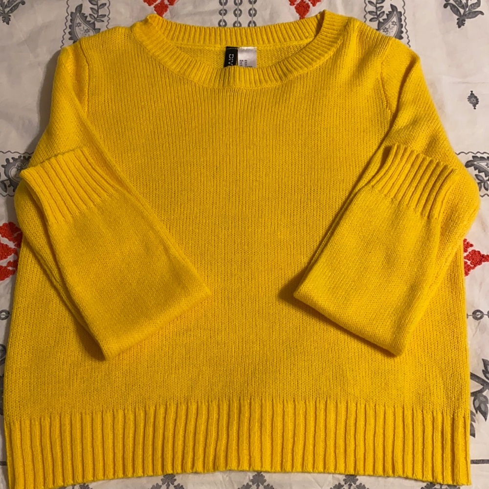 yellow sweater